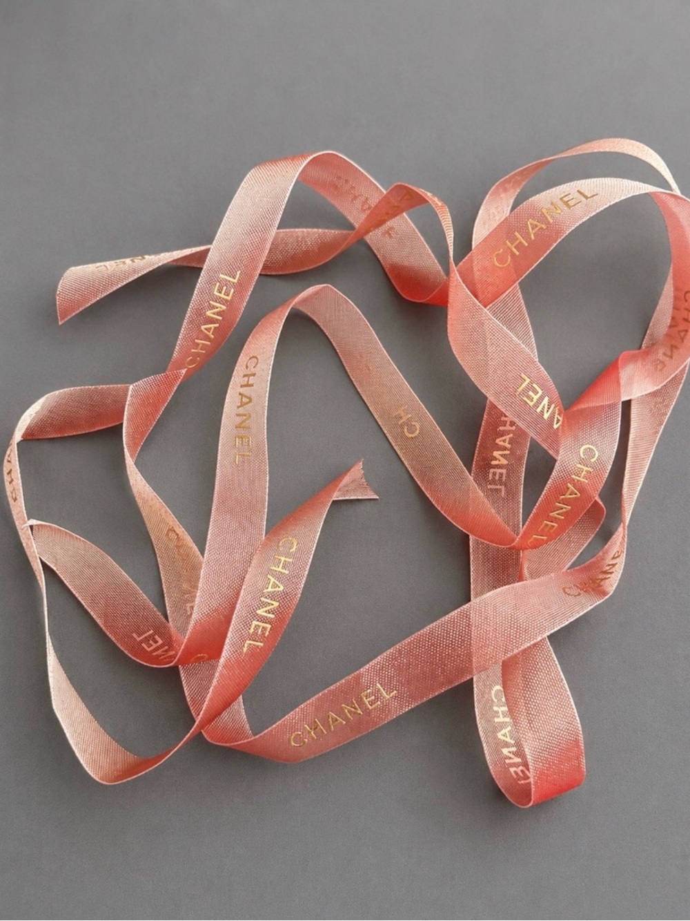 Authentic CHANEL Coral Blush
Pink Gold Logo Ribbon - 2
Pieces x 37" Each